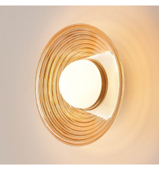 Ronde LED-designwandlamp van amberkleurig glas met witte...